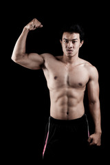 Fototapeta na wymiar Muscular Asian man show his body