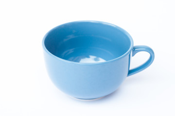 Blue ceramic bowl on white background