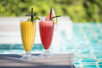 fresh fruit smoothies in glasses