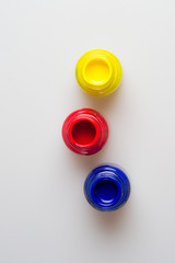  bottles of primary color isolate on white background.