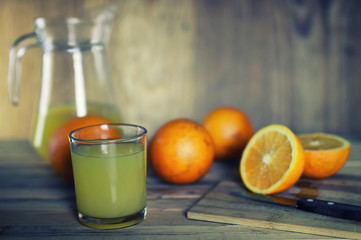 toned orange juice glass slice