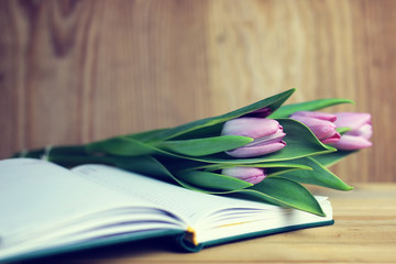 flower on the book and tea