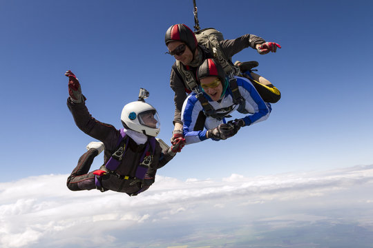 Parachutist student in tandem with an instructor.