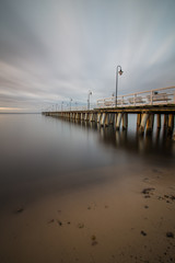 Obraz premium Gdynia Orlowo pier. Vintage photo of Baltic sea shore seascape.