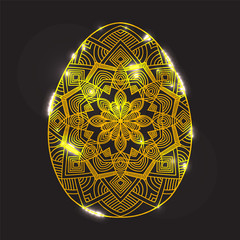 Golden Glowing Easter egg with Mandala pattern with Highlights o