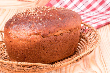 Black bread with fresh coriander closeup