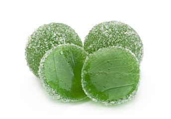 Candied round fruit jelly on white