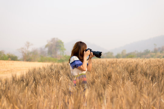 Photographer on Barley field
