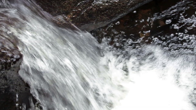 Waterfall a mountain stream