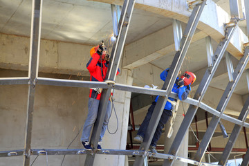 Construction site, the welding workers at work