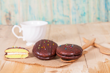 chocolate Sponge sandwich pie on wood table