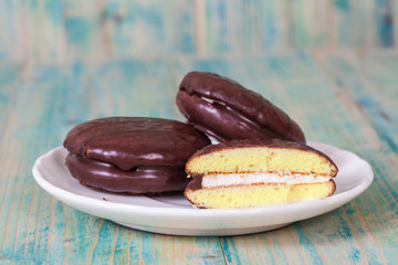 chocolate Sponge sandwich pie on wood table