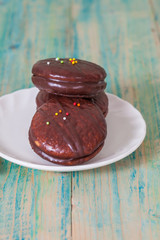 chocolate Sponge sandwich pie on wood table