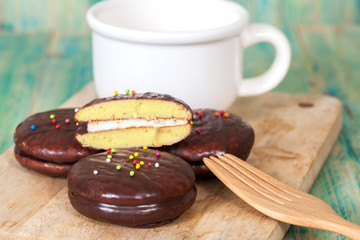 chocolate Sponge sandwich pie on wood table