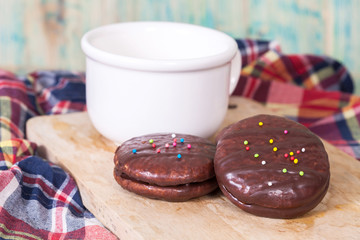 chocolate Sponge sandwich pie on wood table