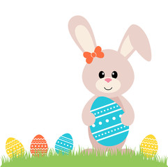 easter bunny with egg on the grass
