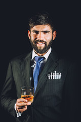 Man enjoying a glass of whiskey