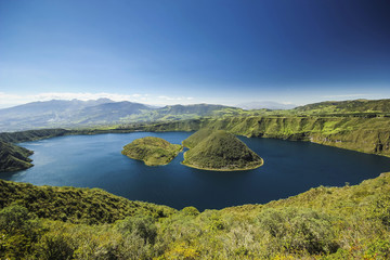 crater lake with two islands at daylight