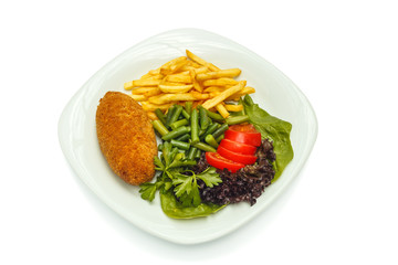 chicken cutlet with vegetables and garnish