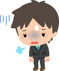 疲れた表情のスーツの男性