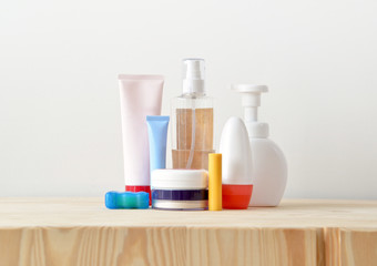 Colorful toiletries on the wooden cupboard