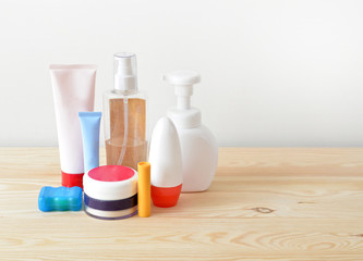 Colorful toiletries on the wooden cupboard