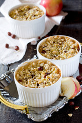 Dessert crumble with apple and nuts in a rustic style