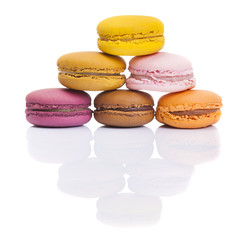 Colorful macarons isolated on white background