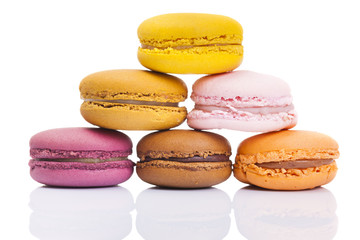 Colorful macarons isolated on white background