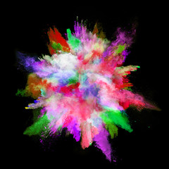 Explosion of colored powder on black background