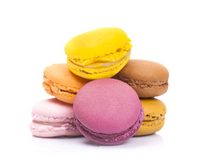 Stack of colorful macarons isolated on white background