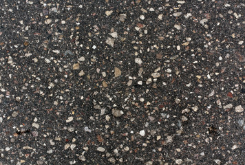 Old gray asphalt surface.
