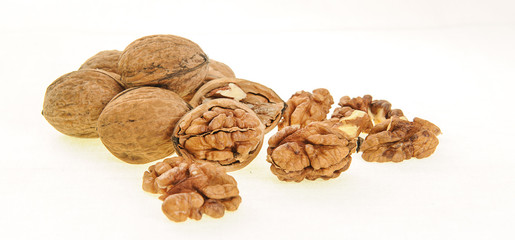 Walnut and walnut kernel isolated on the white background. 