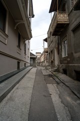 Fototapeta na wymiar Narrow street in center of Tbilisi, Georgia