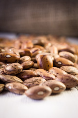 Beans on hemp fabric background 
