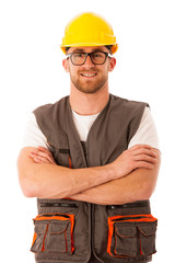 Young worker wtih protective dress and yellow helmet isolated ov