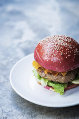 chicken burger with gherkins beetroot bread bun