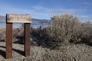 Please Stay on Trail Sign at Mono Lake in California