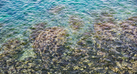 Fototapeta na wymiar Blue sea surface with reflection. Natural background.