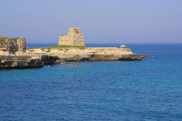 Fototapeta na wymiar Scenic rocky cliffs on the waterfront of Salento