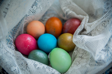 colorful Easter eggs on rustic background