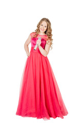 Studio shot beautiful young singing girl in elegant red dress 