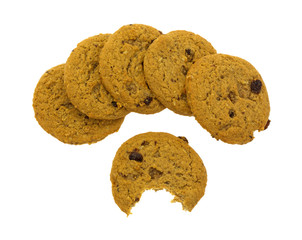 Oatmeal raisin cookies with one bitten isolated on a white background
