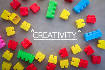 creativity concept word with plastic block