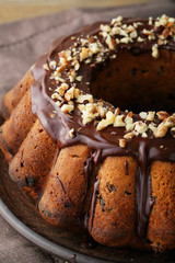 round cake with chocolate and nuts