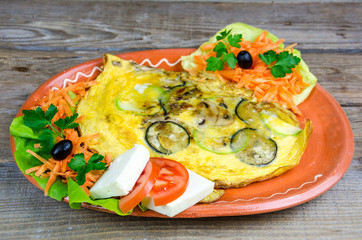 Scrambled eggs with cheese and vegetables © focusandblur