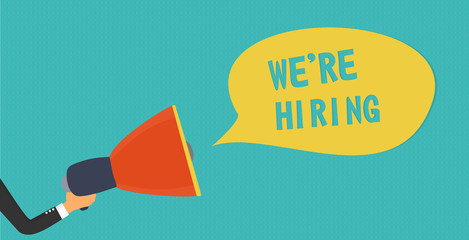 Hand holding megaphone - We are hiring