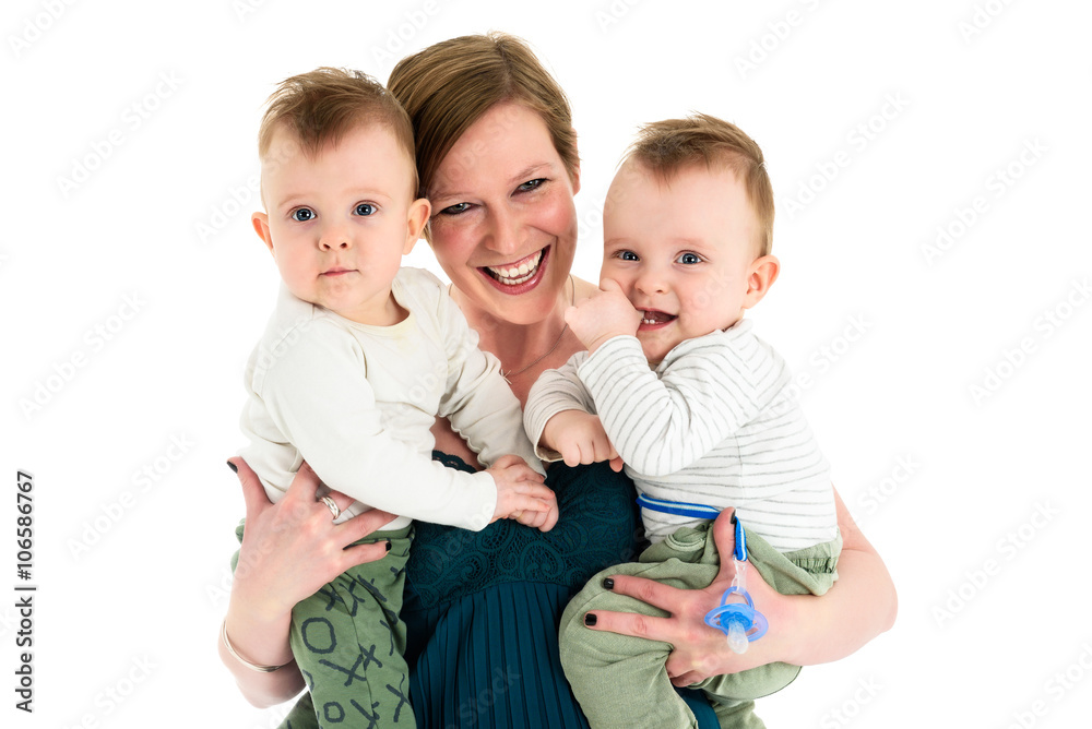 Wall mural mother is carrying twin boys and smiling