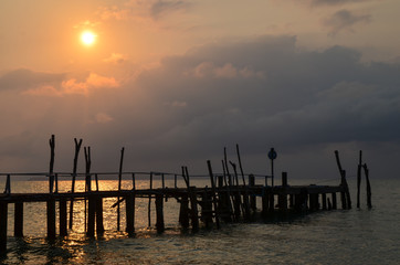 Old wood pier, sunset, Koh Samet island, Thailand
