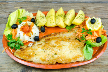 Catfish filet with boiled potatoes